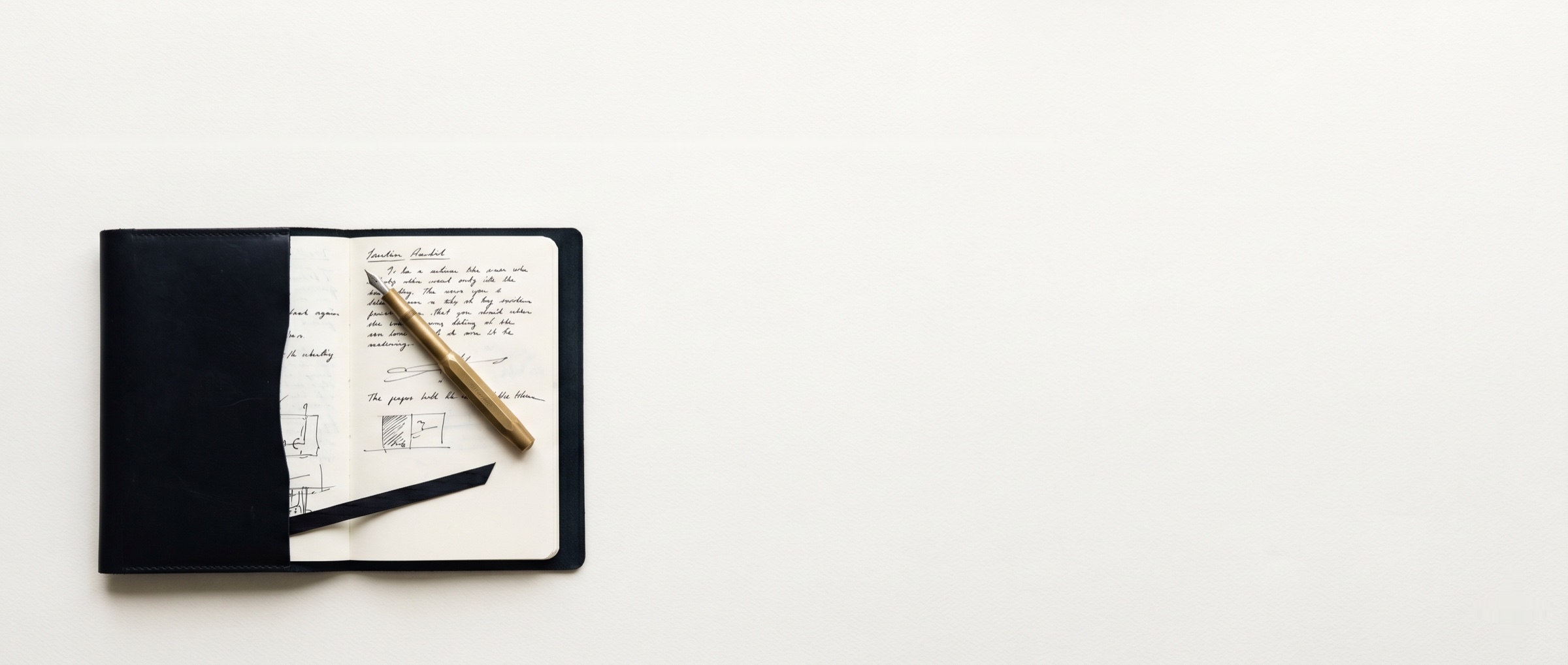 Open ink-black leather notebook with brass fountain pen and handwritten field notes on cream paper — Krasper Insights editorial