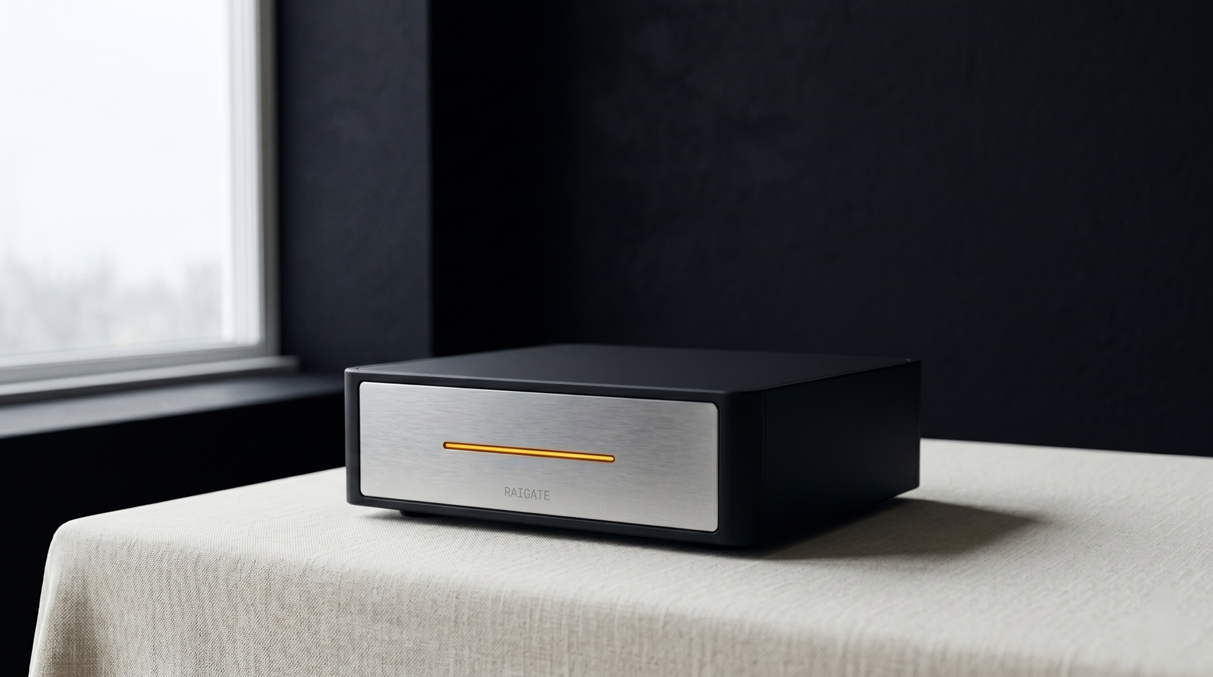 Raigate AI Governance Runtime appliance, a matte-black enterprise unit with an amber status indicator